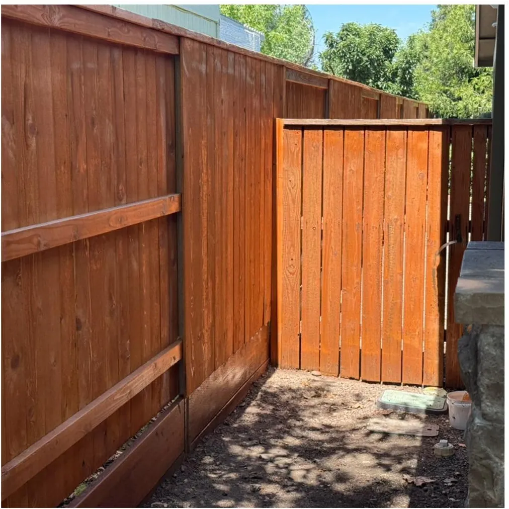 After: the fence and gate washed and sealed